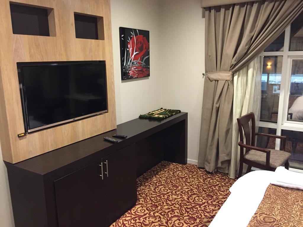 Ashbonh Hotel Suites Эр-Рияд Номер фото